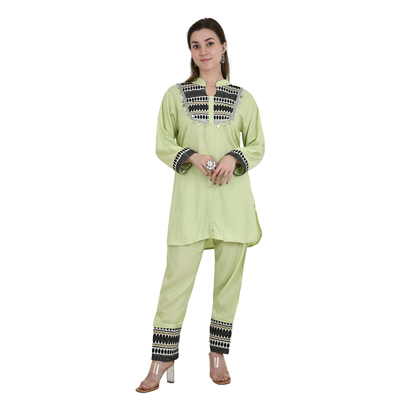 Female model in pistachio green kurti set with black and white embroidered trim - ethnic wear ecommerce photography by Lohar Studio Delhi